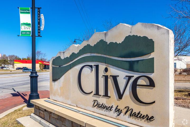 The city welcome sign for Clive, Iowa, featuring its slogan "Distinct by Nature"